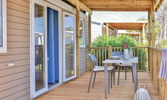 Marina di Montalto Casa | Nice and welcoming mobile home located near the beach with air conditioning of approximately 24 m2 composed of a living room, kitchenette with gas stove, fridge with freezer, pots and pans.A bedroom with a double bed and another bedroom with two single b