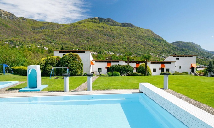 Capriasca Apartamento | Apartamento con WIFI, piscina, TV, patio, mascotas permitida, vista panorámica, aparcamiento
