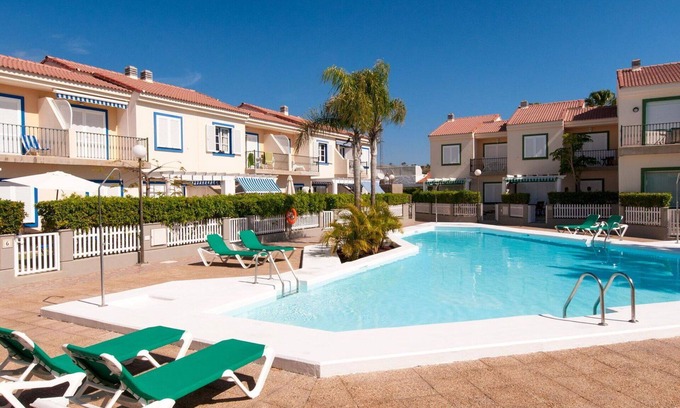 Pasito Blanco Apartamento | Acogedor apartamento con piscina, WIFI, A/C, TV, terraza, mascotas permitida y aparcamiento