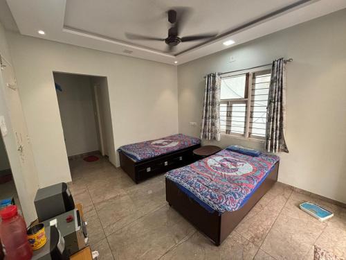 Infocity Casa | Nisarg Home Stay
