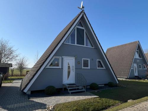 Fedderwardersiel Casa | Nurdachhaus mit Blick ins Grüne- ruhige Lage nahe Yachthafen Fedderwardersiel