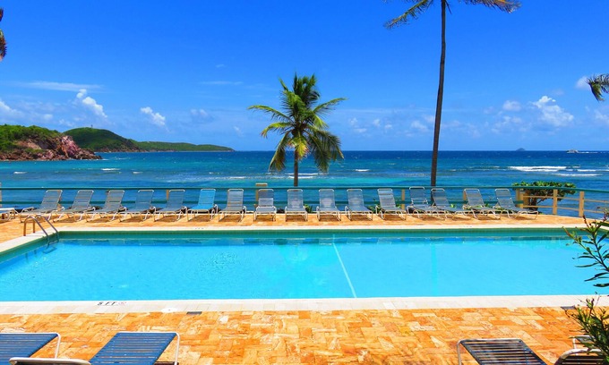 Bolongo Bay Condominio | Condominio frente al mar / piscina en la Bahía de Bolongo; Magníficas vistas y una ubicación increíble!