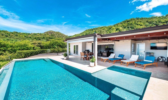 Rio Seco Chalet De Esquí | Ocean View Home in Gated Community