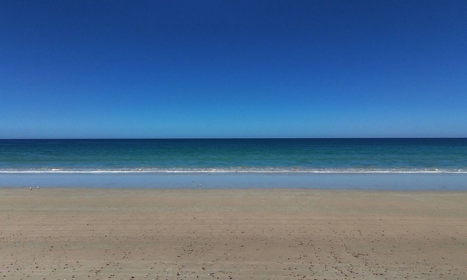 Sellicks Beach Casa | Ocean views, Sunset on the rear deck, Pet friendly.