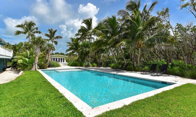 Islamorada Casa | Turtle Cove - Finca frente al mar con 4 cabañas acogedoras