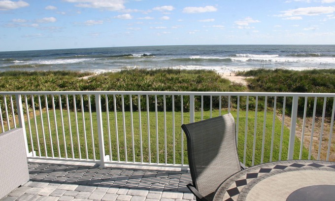 Palm Coast Casa | Oceanfront Executive Home with private beach and backyard dunes.