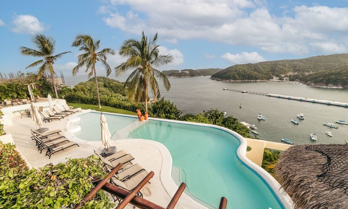 Playa Chahué Condominio | Condominio de dos habitaciones frente al mar con terraza privada en la azotea | Caminar a todo