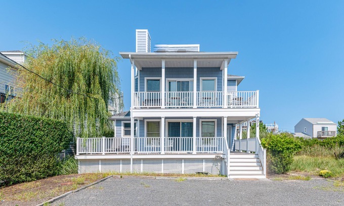 West Hampton Dunes Casa | Oceanview home with a washer/dryer, spacious deck, central AC, fireplace