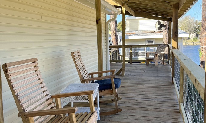 Suwannee Casa | Old Florida Waterfront Getaway - Large Porch, Big Dock, & Pet Friendly