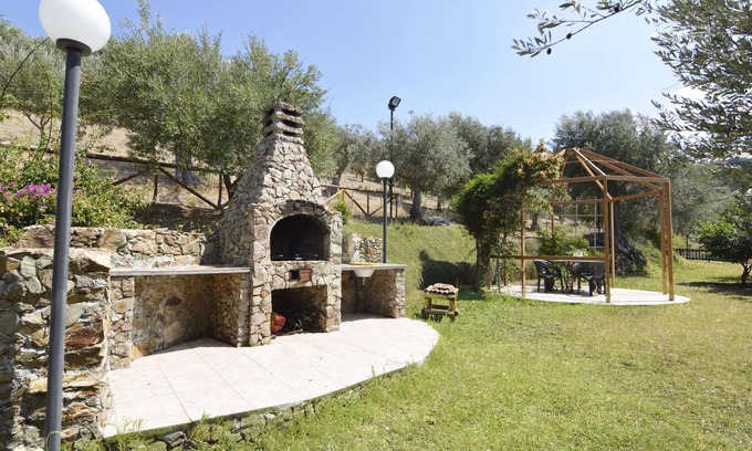 Capri Leone Cabina | CHALET ENTRE LOS ÁRBOLES DE OLIVA: wi-fi jardín barbacoa veranda maravilloso panorama