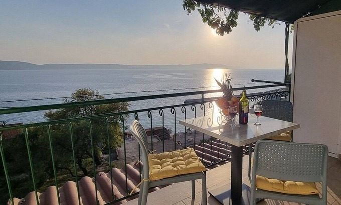 Zivogosce Apartamento | Apartamento de una habitación con balcón y vista al mar Zivogosce - Porat, Makarska (A-16289-b)