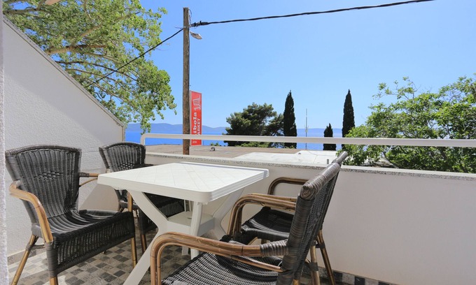 Zivogosce Apartamento | Apartamento de una habitación con balcón y vista al mar Zivogosce - Porat, Makarska (A-18218-a)