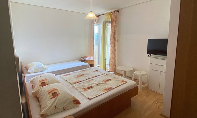 Lopar Apartamento | Apartamento de una habitación con balcón y vista al mar Lopar, Rab (A-23747-c)