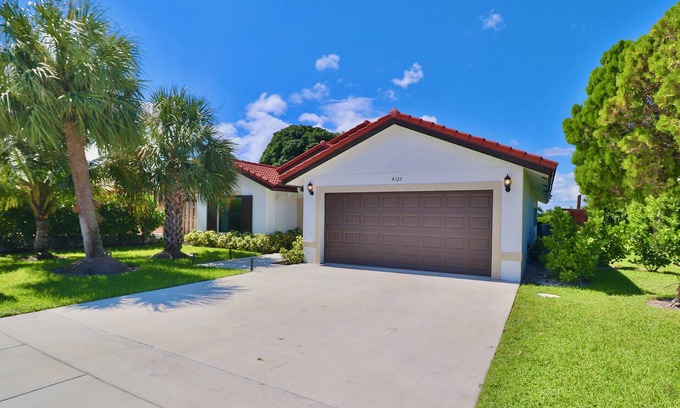 Southwest Casa | Open Concept Sunset Galore in West Palm Beach