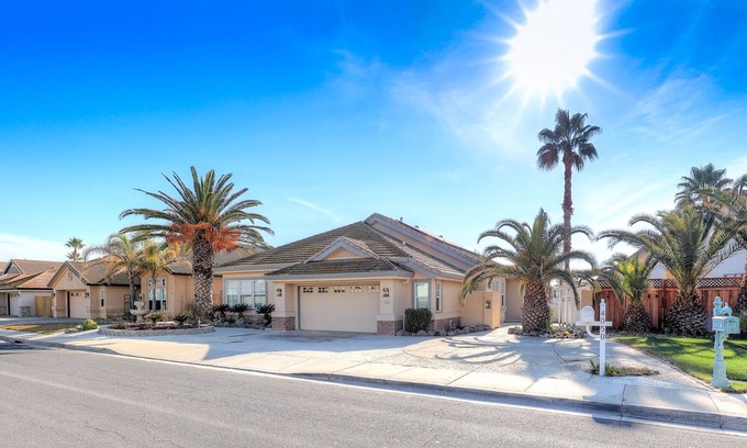 Discovery Bay Casa | OPEN FLOOR PLAN WITH SIDEYARD PARKING AND WONDERFUL REAR DECK WITH OVERHANG