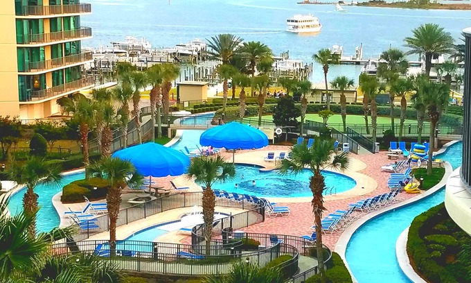 Orange Beach Condominio | 🛑PECES, PISCINAS INTERIORES / EXTERIORES, TUBOS CALIENTES, RÍO PERFECTO / DESLIZAMIENTO DE AGUA, DESLIZAMIENTO GRATIS