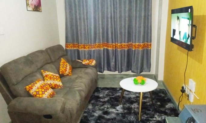 Nairobi Apartamento | orange kitenge house