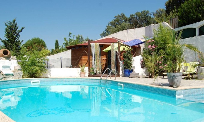 Sussargues Casa | ORIGINAL PAILLOTE, EXOTIC GITE UNUSUAL AND INTIMATE SHARED POOL AQUABIKES