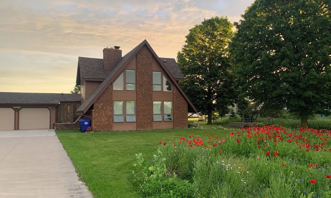 Oneida Otro | Our Thunder Moon Farm Stay- sleeps 7, framed by wildflowers. 4 miles to GB.