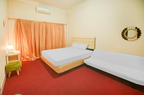 Panakkukang Hotel | OYO 94669 Hotel Puri Inn Panakkukang Makassar