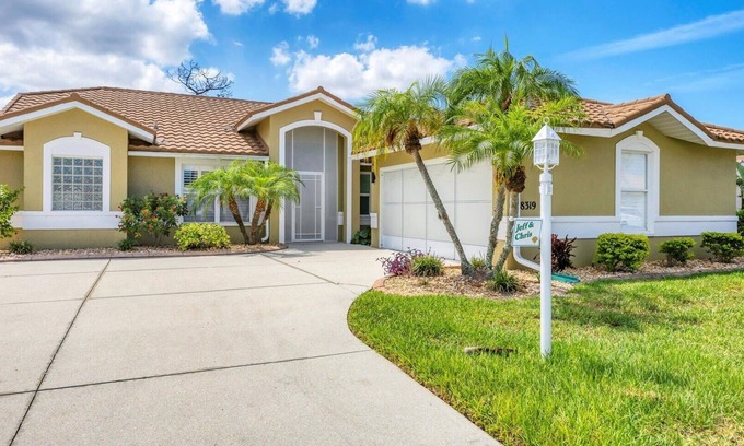 Englewood South Casa | Oyster Creek Beautiful home in golfing community with water and preserve views, golf cart included