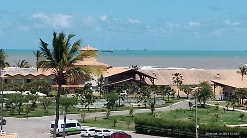Barra dos Coqueiros Apartamento | Pé na areia e vista mar