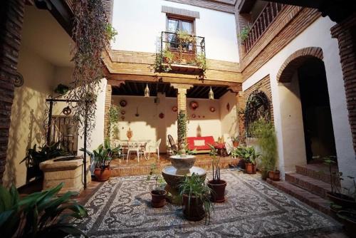 Guadix Casa | Palacete Magistral Domínguez habitaciones