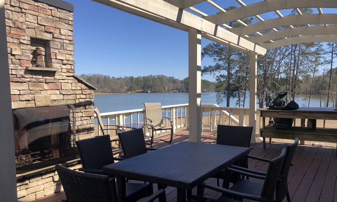 Dawsonville Casa | Panoramic & unobstructed lake views, level walk to shore, & private sandy beach