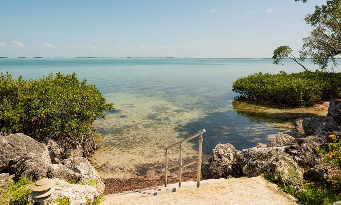 Key Largo Casa | Increíble casa adosada de Key Largo en Buttonwood Bay con deslizamiento en barco privado