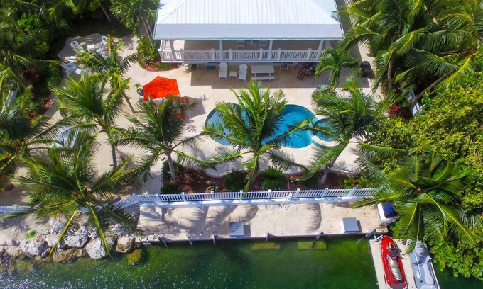 Venetian Shores Casa | Paraíso tropical en Shores venecianas. Lujo Piscina climatizada / Spa, 4 bicicletas y kayak
