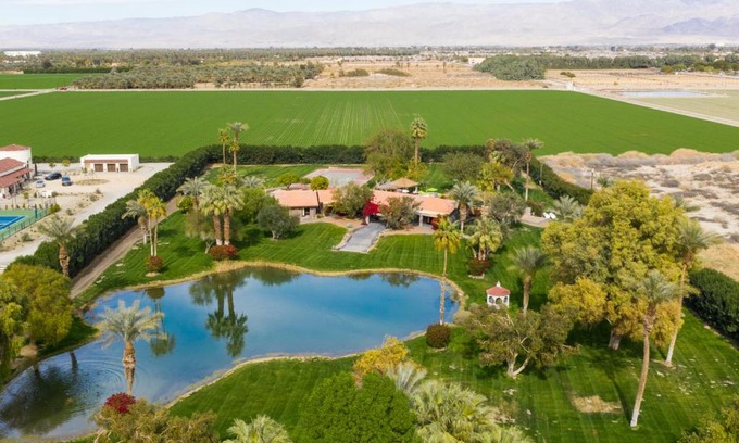 Palm Springs Casa | Paradiso by AvantStay Pool Lake Fire Pit Billiards Room Elegant Secluded Estate