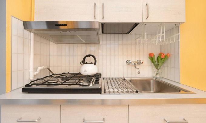 Baluty Apartamento | Pastel Blue Studio in Lodz by Renters