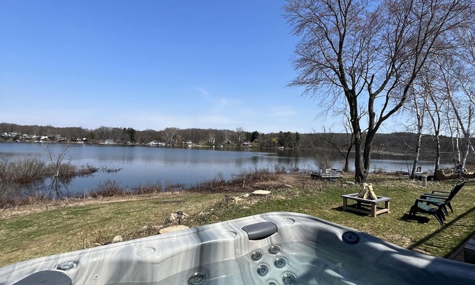 Delton Casa | Peaceful & Private Lakefront House on Shelp Lake, hot tub is open year round
