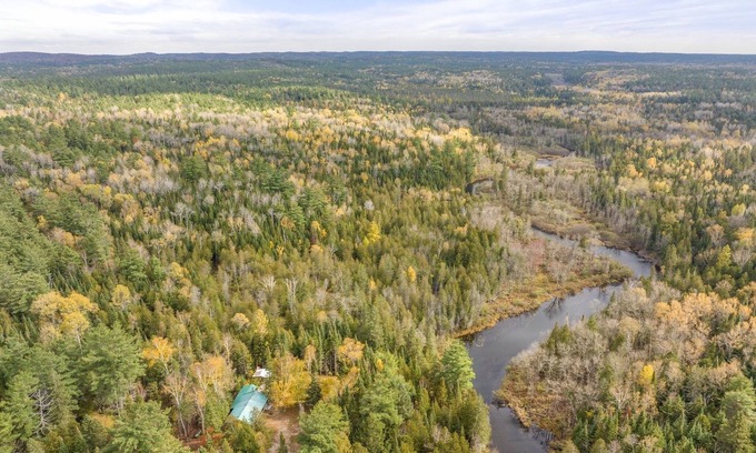 Bancroft Cabaña | Peaceful Riverfront Cabin on 43 Private Acres