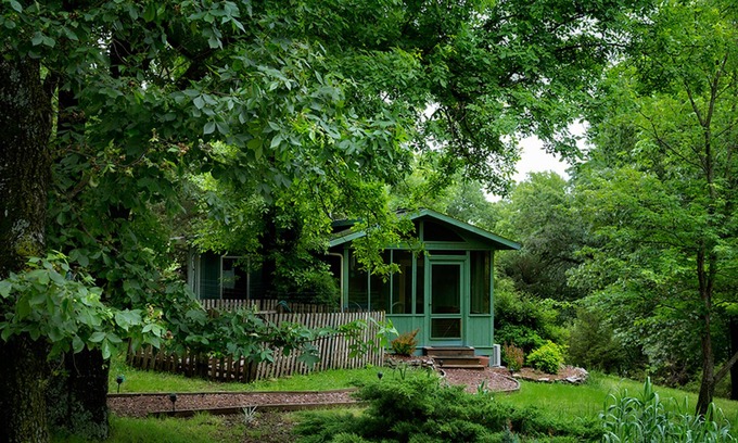Sylvan Shores Cabaña | Peaceful wooded cottage with seasonal lake views, WiFi, private parking, & patio