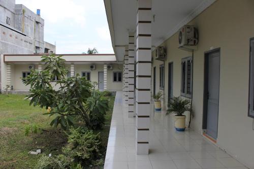 Medan Casa | Penginapan Transit Tomato