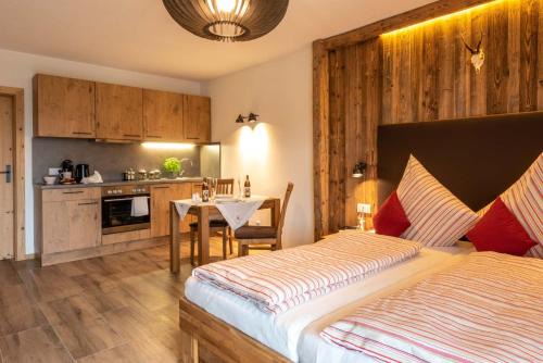Otterfing Casa | Pension und Appartements Wild