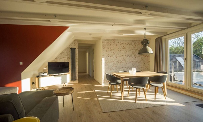 St. Peter-Ording Apartamento | Ático para 6 personas, azotea, piscina, sauna, jardín.