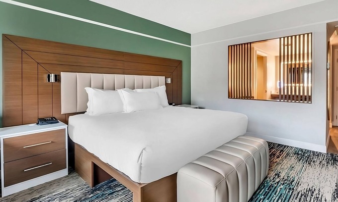 Las Vegas Hotel | Perfect Vegas Suite with Outdoor Pool Access for Relaxation | 2 Family Suites