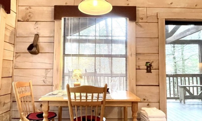 Tellico Plains Cabina | Perfectly private! Hot tub, king sized bed, grill, washer/dryer, and motorcycle friendly! Studio Cabin by RedAwning