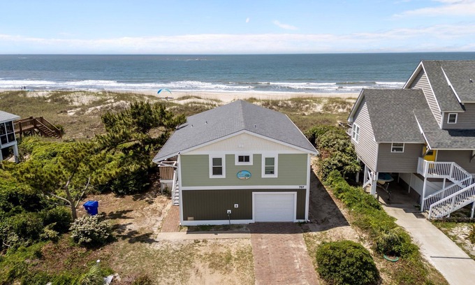 Caswell Beach Casa | Pet friendly private ocean front cottage nestled in peaceful Caswell Beach. Running Down A Dream