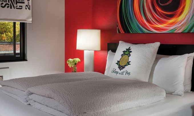 Belltown Hotel | Pineapple Treats & Designer Toiletries in a Vibrant Room near Pike Place Market