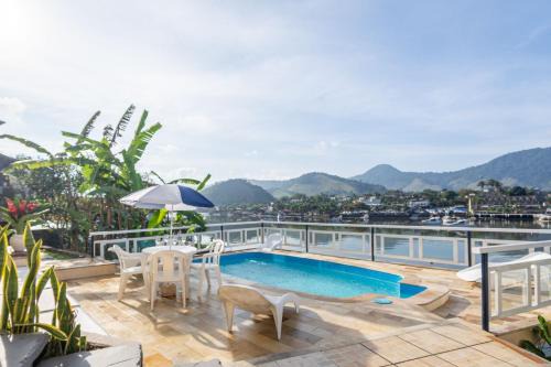 Caieira Casa | Piscina, caiaque e sauna em praia privativa