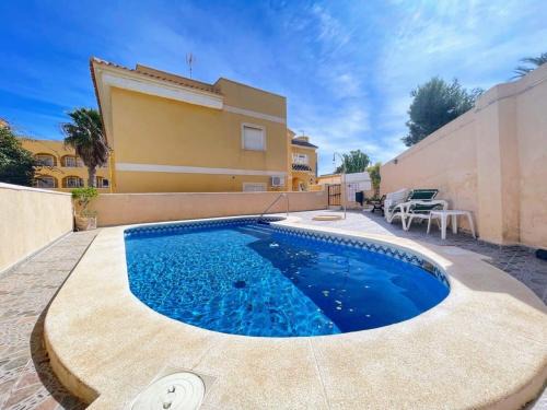 Orihuela Costa Casa | Pleasant 4 Bedroom Townhouse with Com Pool VM7