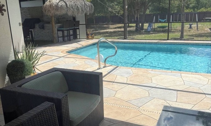 Lehigh Acres Casa | Pool house 4 bedroom 2 bath, Playground, ping pong table, foosball table & more.