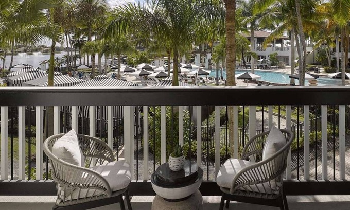 Hunt Club Hotel | Pool View Room Two Queen Room at PGA National Resort - Outdoor Fun!