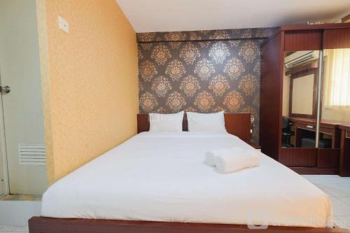 Kebagusan Apartamento | Pool View Studio at Kebagusan City Apartment By Travelio