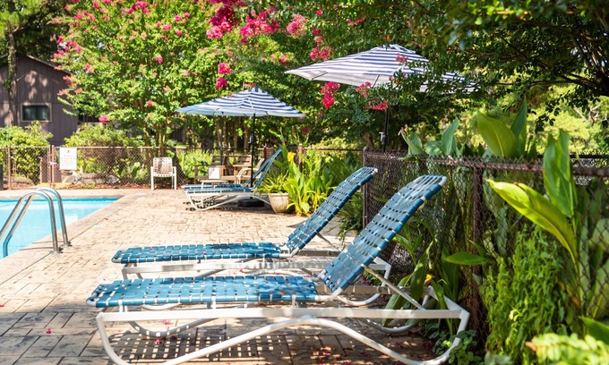 Mount Ida Apartamento | Poolside King Cabana with full kitchen, king bed, sleeper sofa and pool access. by RedAwning