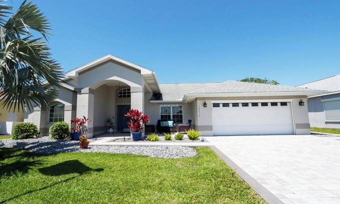 Cypress Lake Casa | Poolside Paradise is a luxurious modern home in the popular community of Parker Lakes