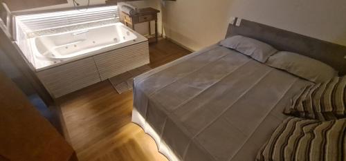 Itaunas Otro | Pousada Dunas - Suítes com HIDROMASSAGEM no coração da Vila